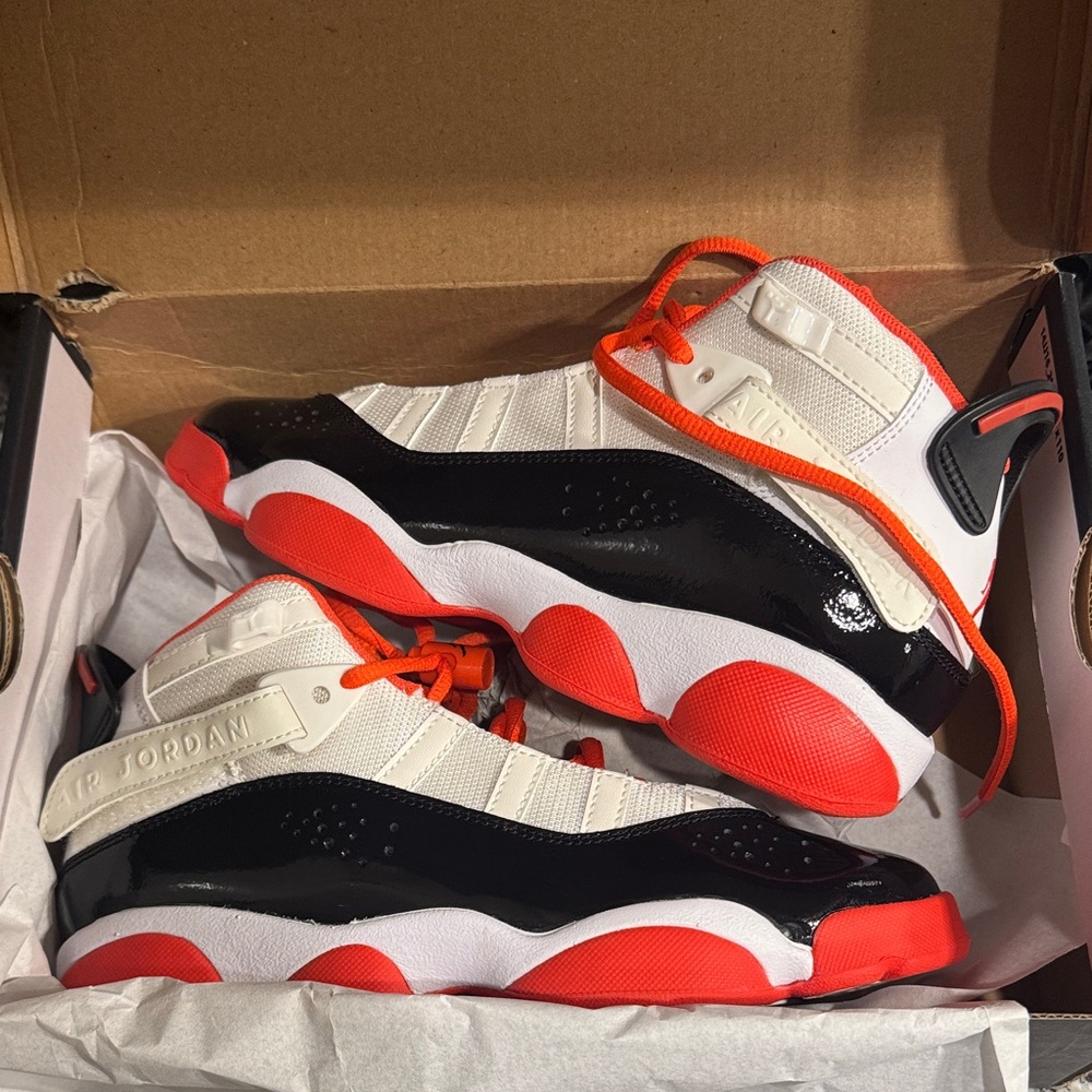 Jordan Kids Sneakers - White, Black, and Orange size 5Y